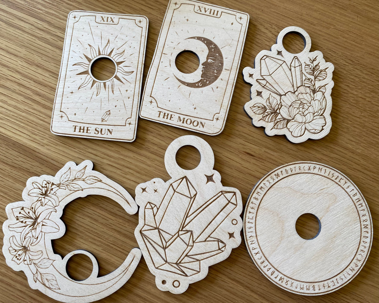 Crystal ball holder with runes and symbols