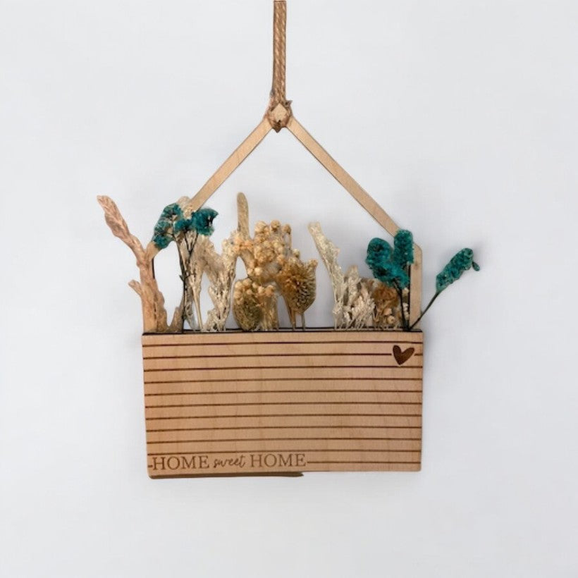Hanging house with pocket for dried flowers