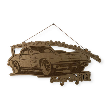 Skylt "om du inte tittar på din bil efter att du har parkerad den - så äger du fel bil"