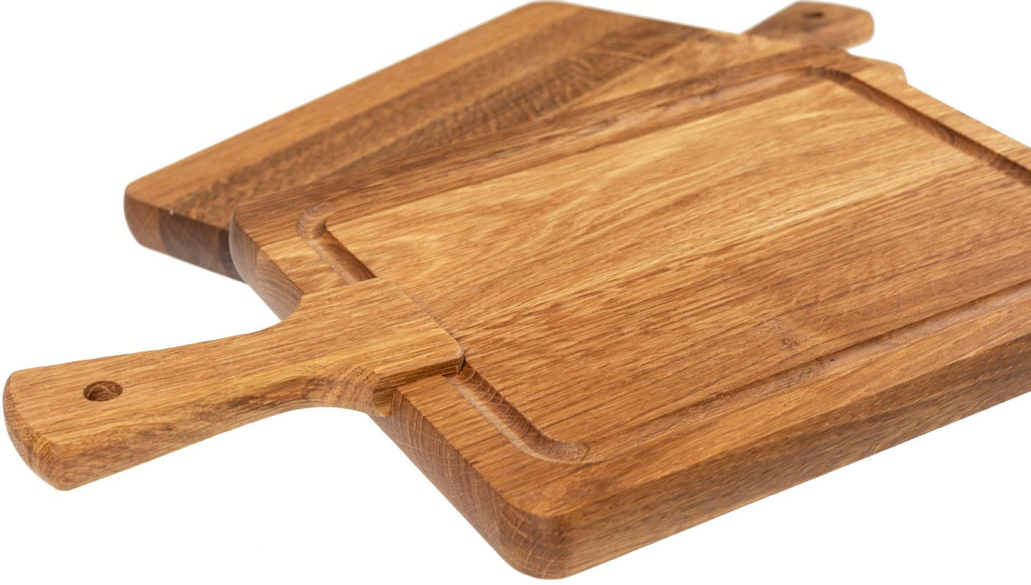 Cutting board in oiled oak with juice channel &amp; handle